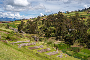 Inca archaeological site of Chinchero with terraces and mountain, an Architecture Photo by GoodGoods