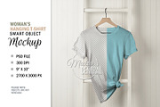 Mockup T-Shirt on White Wall Hanger, a Shirt Mockup by HaywireMedia & Mockups (Thumbnail 1 of 3)