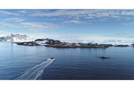 People on motorboat sailing polar