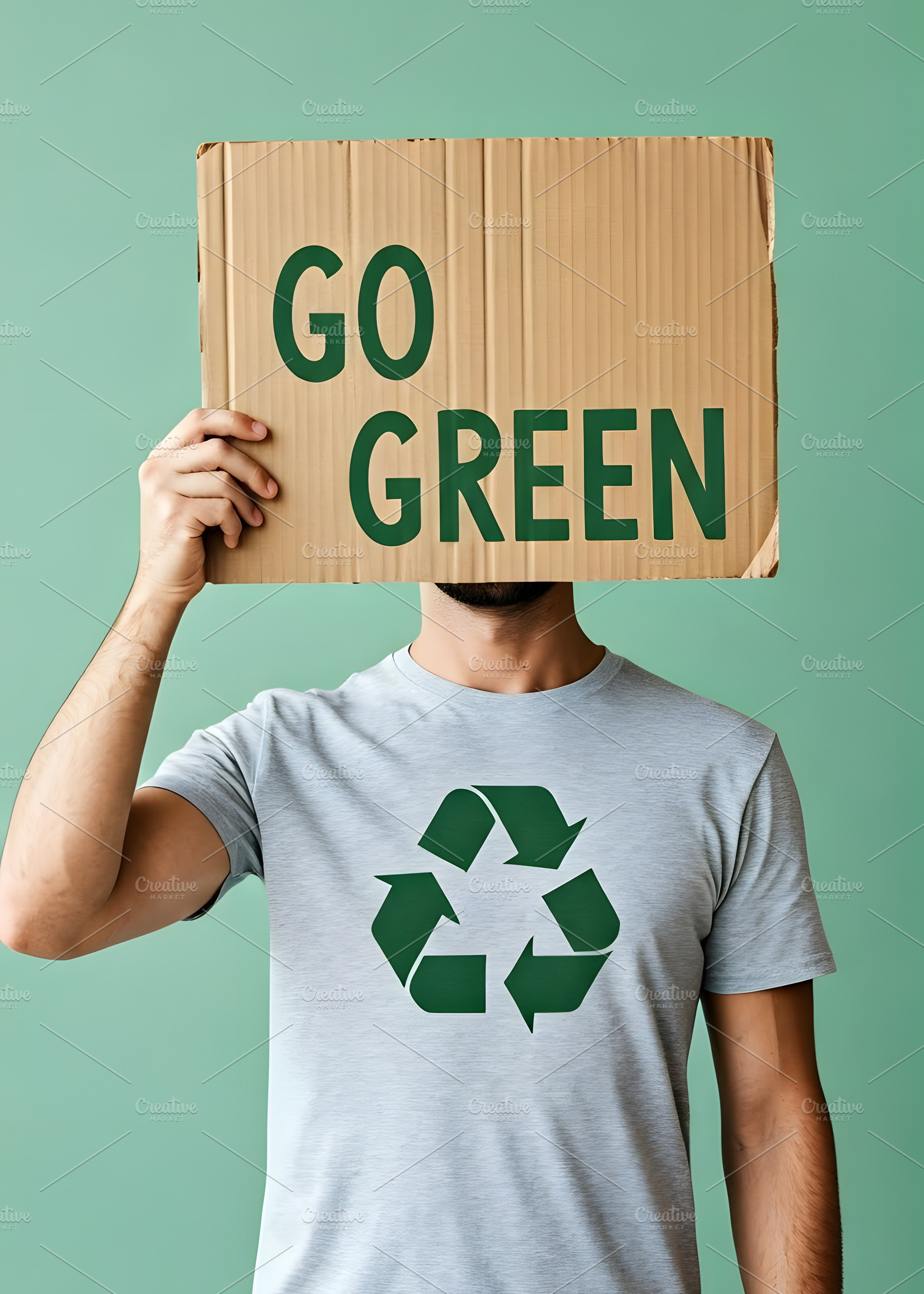 Man holding a Go Green sign made of, a Nature Photo by Stock Shape