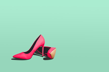 Red high heels isolated on a bright stock photo containing fashion and elegant