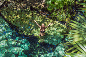 Female tourist enjoying a refreshing, a Nature Photo by Elizaveta Galitskaya