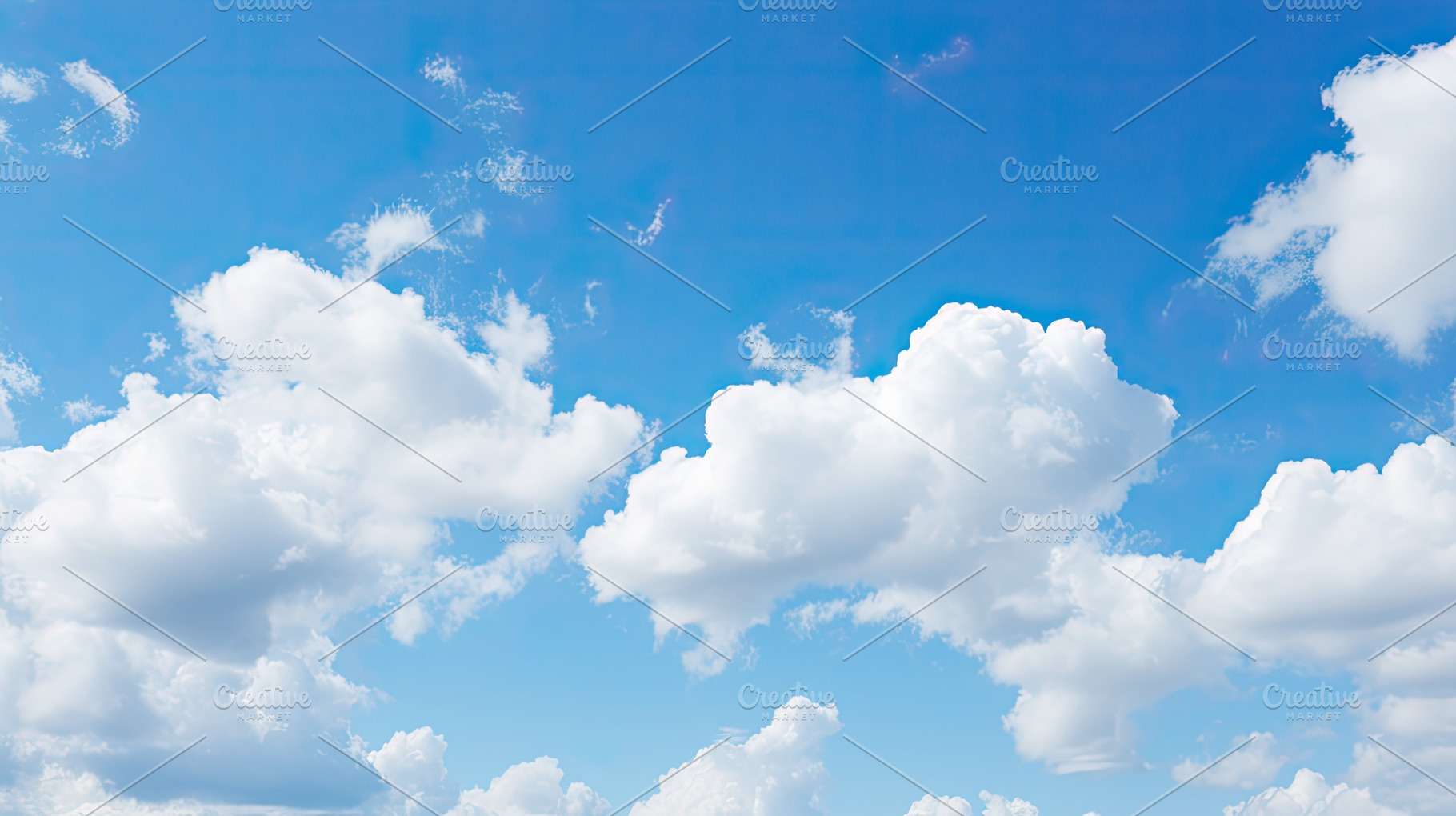 White clouds in a blue sky, Blue sky, a Photo by SaroStock