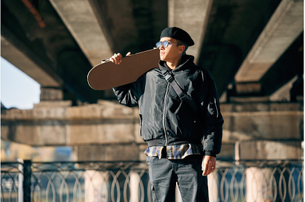 Skater male with skateboard posing, a Person Photo by Gladkov photography