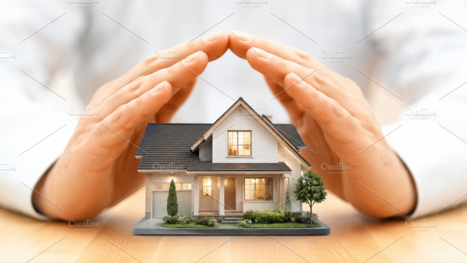 Protecting a house with hands, a Photo by Beautiful things