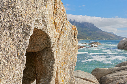 Rocky coastline of the Camp¬¥s Bay, Western Cape, a Photo by Peopleimages.com
