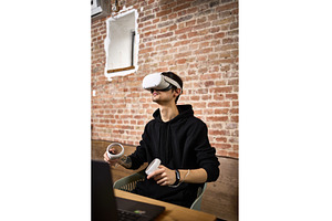 Man immersed in virtual reality, a Technology Photo by wip3out