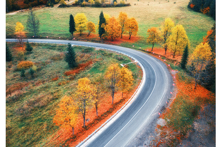 Aerial view of winding road in, a Transportation Photo by den-belitsky