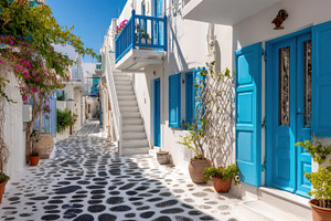 Charming narrow street in Santorini, a Photo by Beautiful things