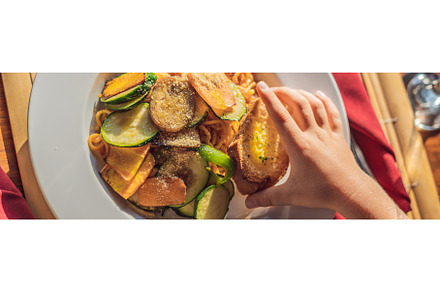 Pasta with fried vegetables and, a Food & Drink Photo by Elizaveta Galitskaya