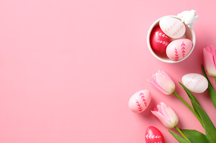 Easter holiday flat lay composition. Easter eggs with tulips on pastel pink tab, a Holiday Photo by photoguns