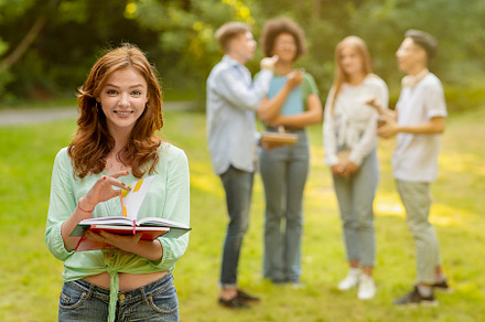 Portrait Of Smiling College Student, a Photo by Prostock-Studio