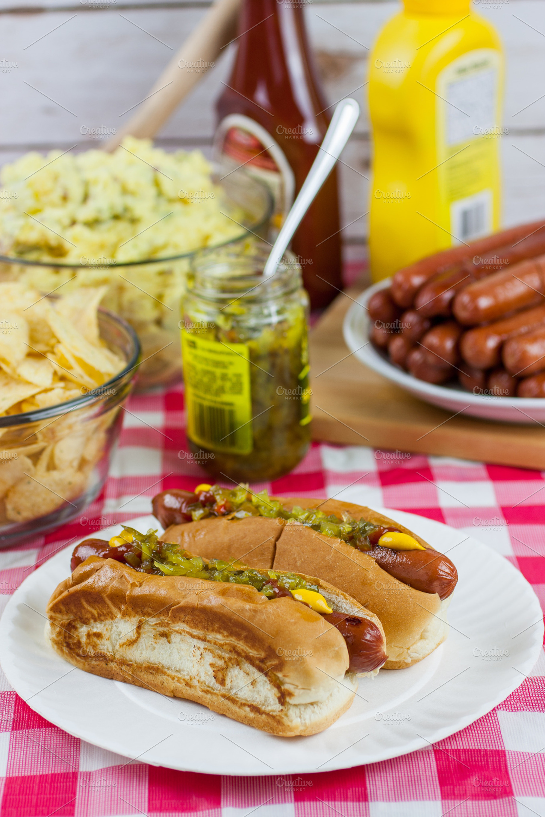 Grilled hot dogs on a picnic table stock photo containing american and bread, a Food & Drink Photo by Southern Light