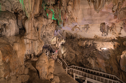 pathway underground cave in Laos, with stalagmites and stalactit, a Nature Photo by Casanowe-studio