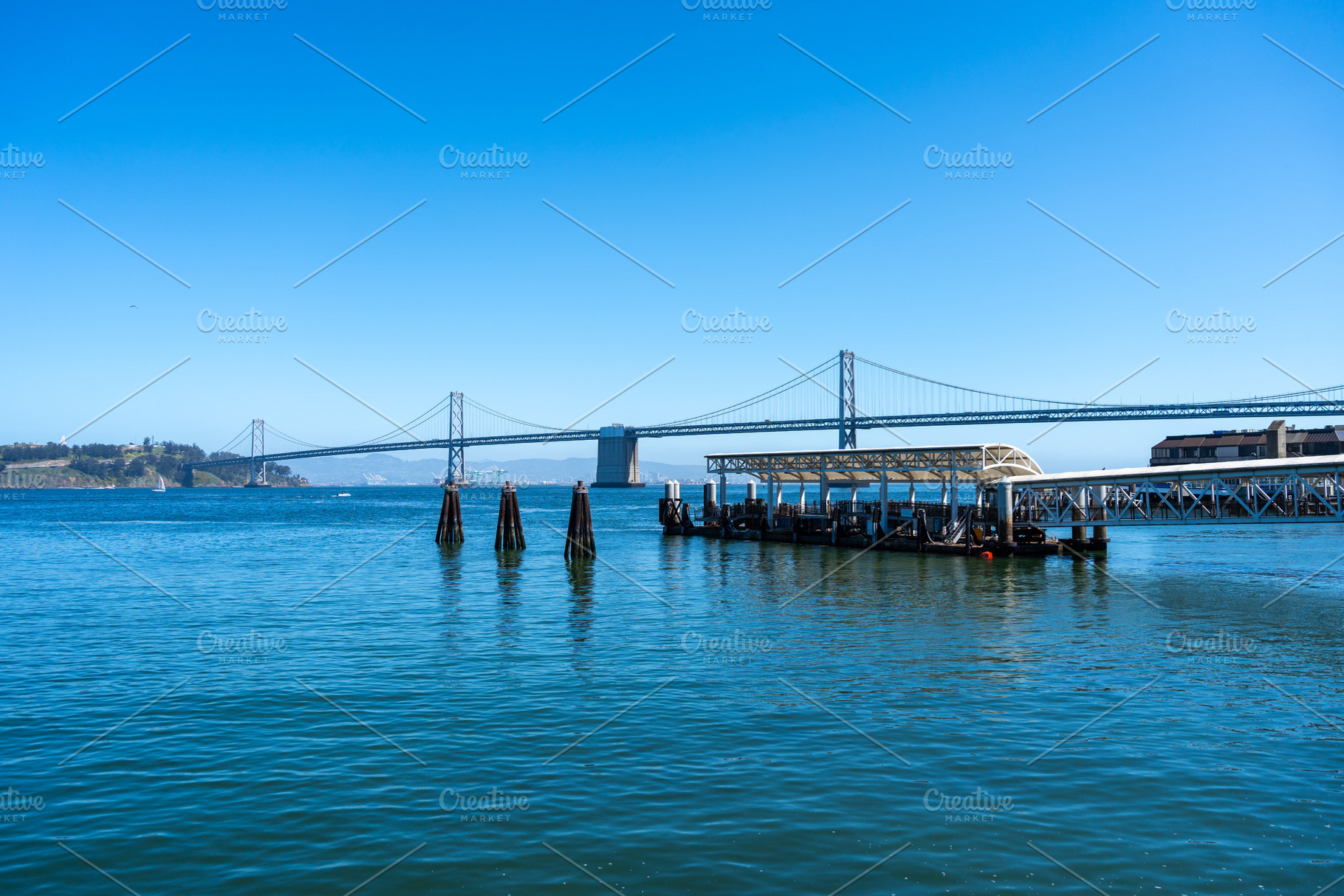 Scenic waterfront view with Oakland Bay Bridge in San Francisco, an Architecture Photo by GoodGoods