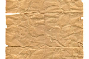 Heavily brown wrinkled paper sheet isolated on white, a Background Photo by GoodGoods