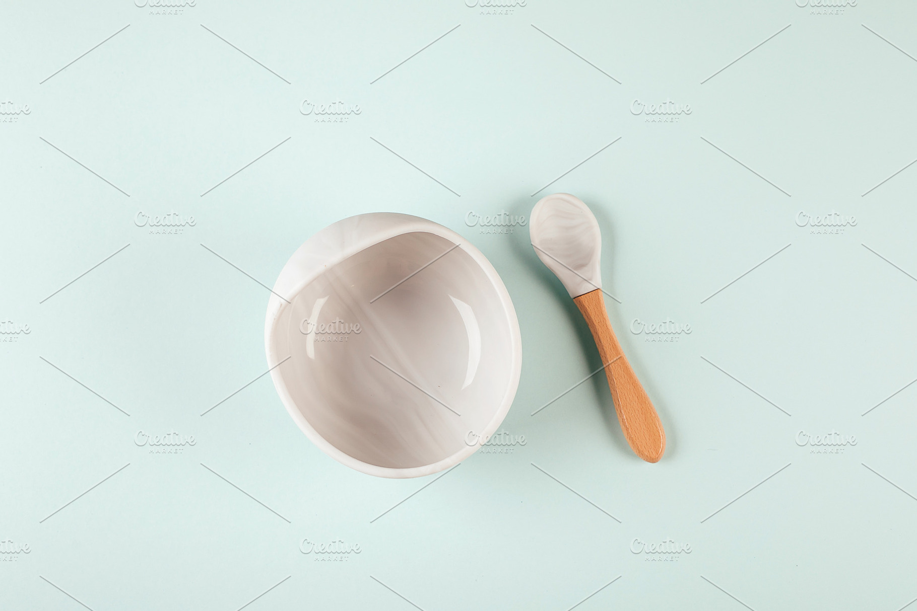Baby bowl, spoon. Flat lay, an Abstract Photo by Anikona