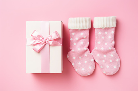 A pair of socks and a gift box sit o, a Photo by Iftikhar Alam