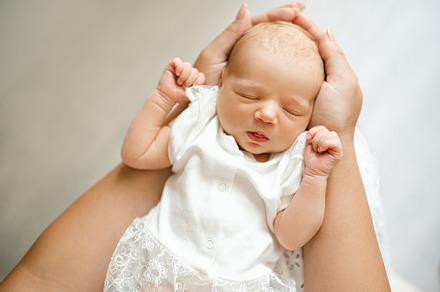 Cute baby girl sleep at home in bed, a Person Photo by morrowlight