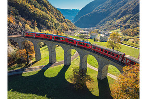 Aerial view of the red Bernina, a Transportation Photo by den-belitsky