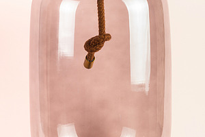 A glowing lamp on a pink background, a Technology Photo by AlexBush