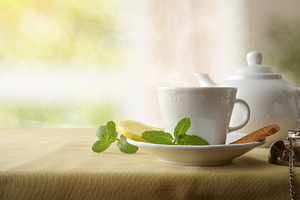 Green tea on a table with tablecloth in living room, a Food & Drink Photo by Davizro's Market