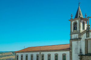 Baroque church tower high angle view, braganca, portugal, an Architecture Photo by DanFLCreativo