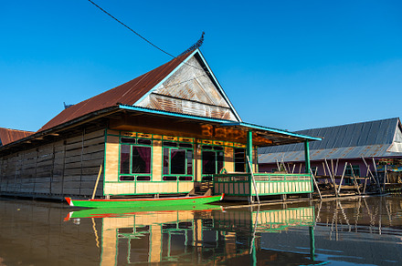 Traditional Bugis floating houses on Lake Tempe, Sulawesi, Indon, an Architecture Photo by GoodGoods