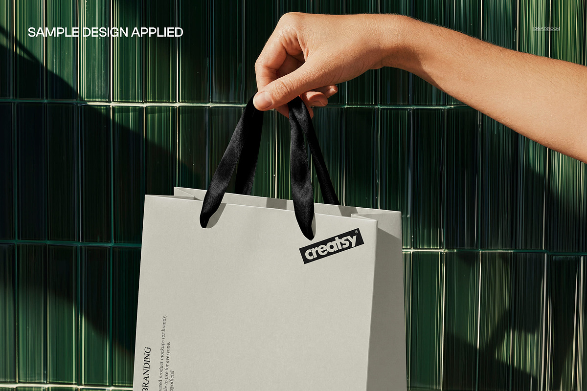 Shopping Bag in Hand Mockup, a Packaging Mockup by creatsy5 (Photo 4 of 5)