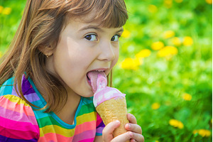 The child eats ice cream. Selective, a Person Photo by yanadjana