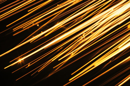 Abstract Golden Light Rays & Sparkle, a Background Photo by Virgo Studio