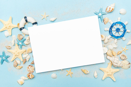 Nautical themed blank card surrounded by seashells