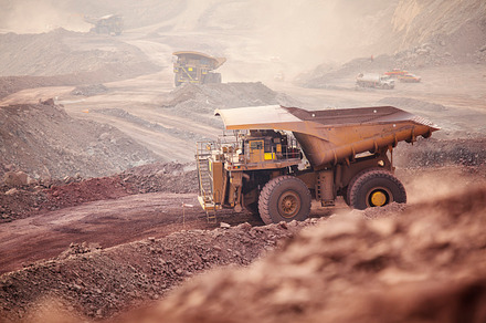 Mining in chile containing close-up, construction machinery, and defocused