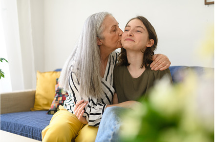 Senior grandmother with teenage, a Person Photo by HalfPoint