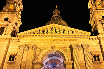 Illuminated facade of historic cathedral at night showcasing architecture. St., a Photo by AS photostudio