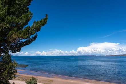 Llachon beach with a scenic view of Lake Titicaca, Peru, a Photo by GoodGoods