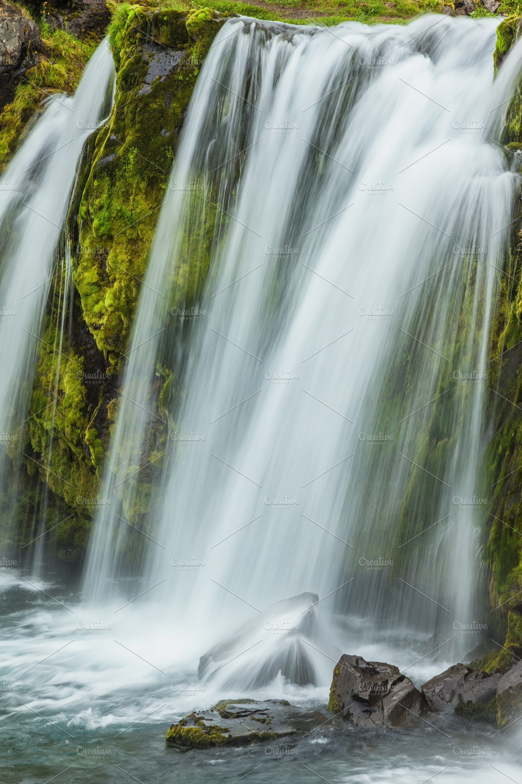 Powerful cascade falls on mossy break, a Nature Photo by kavram