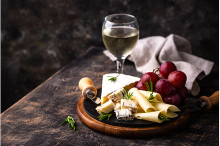 Different types of cheese, wine and