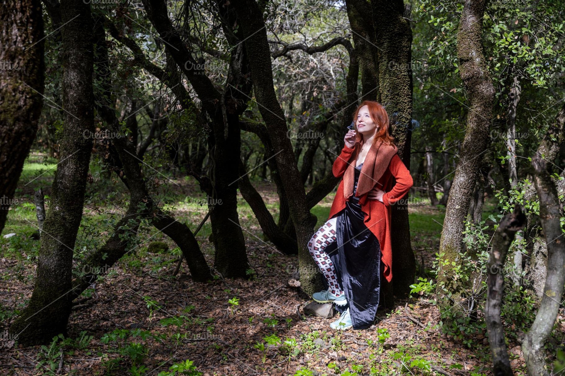 Redhead woman in a long red cardigan, a Person Photo by Imaginarium