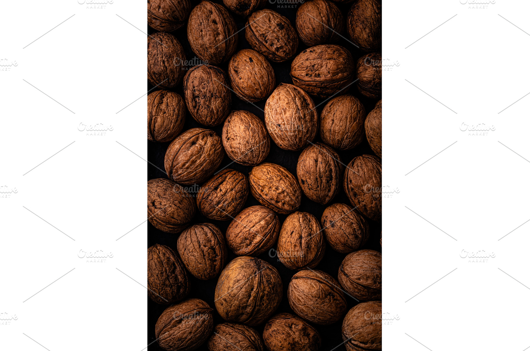 Walnuts background with black and, a Food & Drink Photo by Yulia Furman