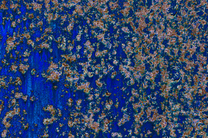Close-up of a blue painted metal surface with scattered rust pat, a Background Photo by Ales Munt
