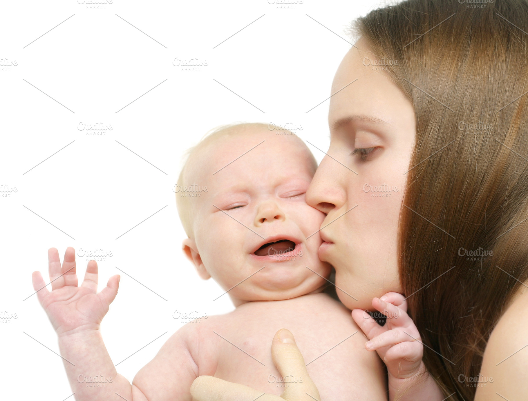 Mother kiss her baby, a Photo by saiko3p