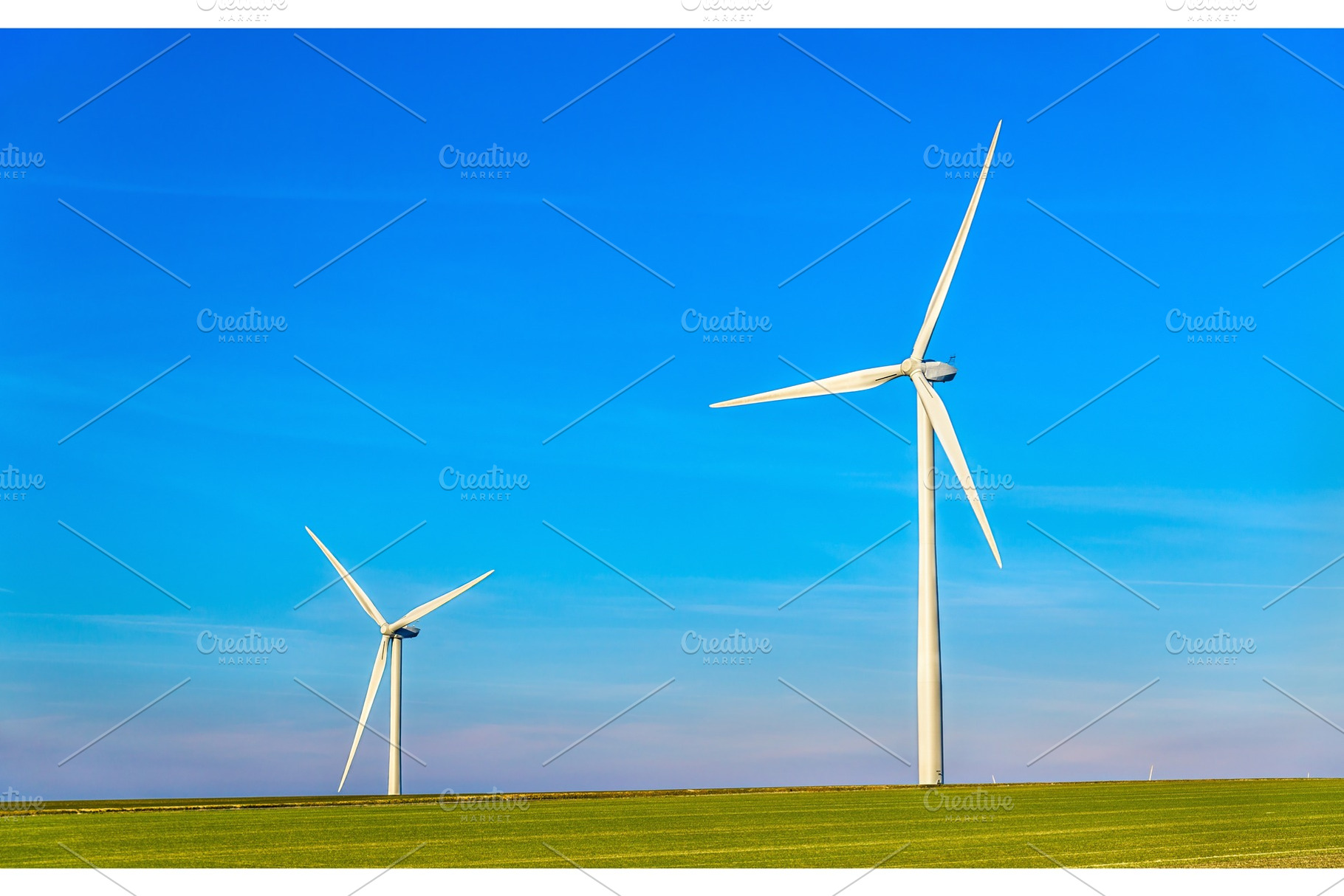 Wind turbines in a field - France, Marne Department, a Technology Photo by Leonid Andronov
