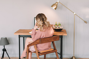 Young woman at the table