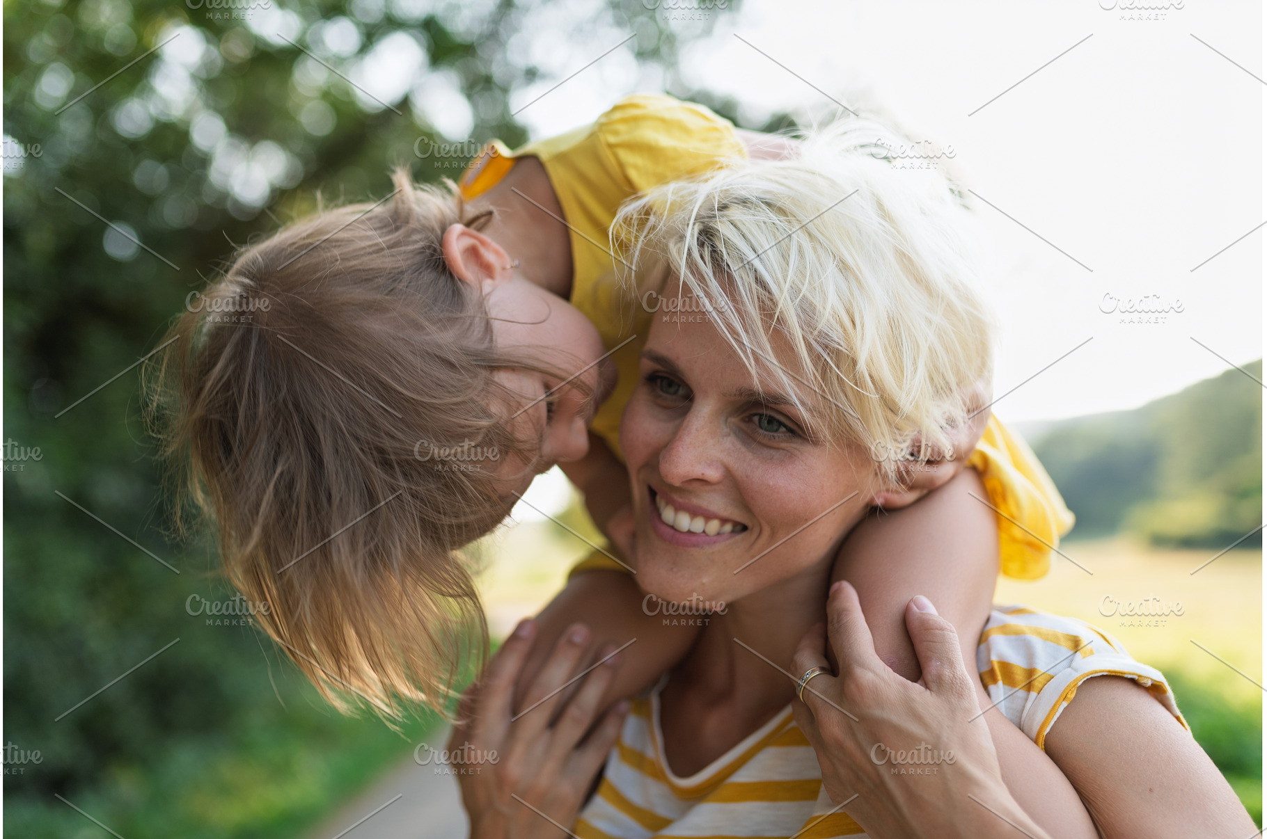 A portrait of mother carrying little, a Person Photo by HalfPoint