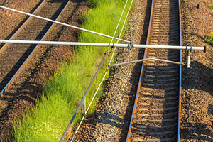 Railway overhead contact system, a Transportation Photo by Leonid Andronov
