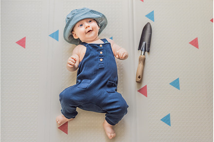 Adorable baby dressed as a little