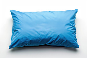 Blue soft pillow on white background, a Beauty & Fashion Photo by AlyaAnd