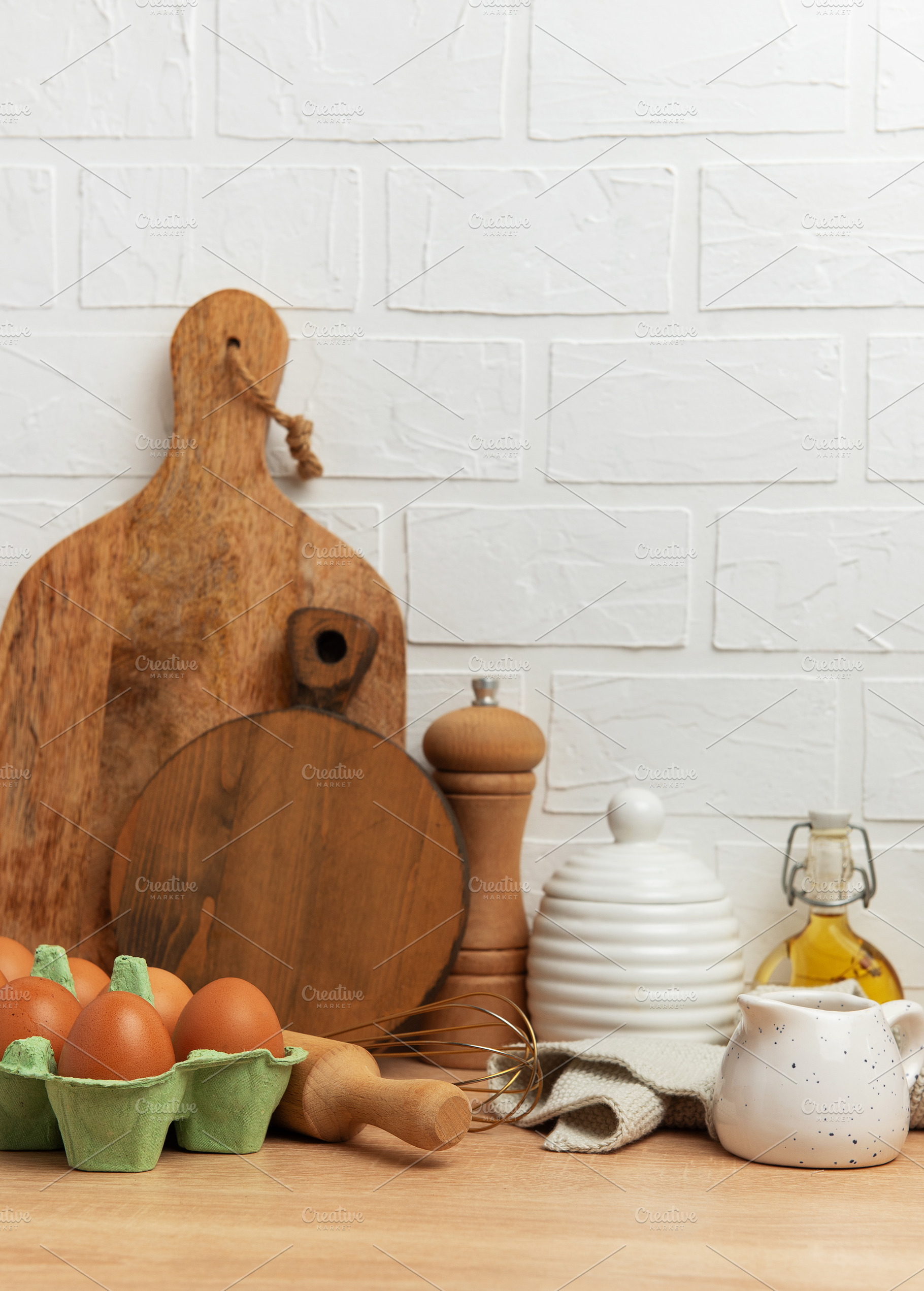Kitchen utensils and food ingredients creating cozy culinary sce, a Food & Drink Photo by Olena Rudo
