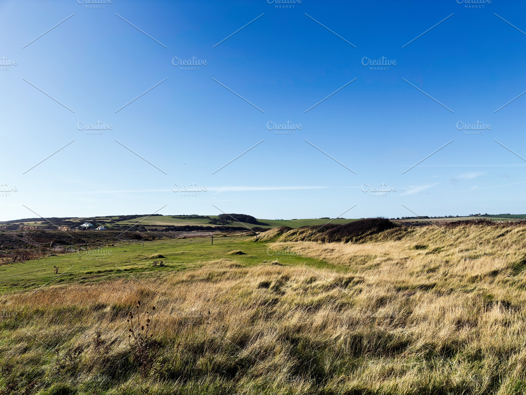 Open coastal landscape at Seven Sisters Cliffs in East Sussex with blue sky and, a Nature Photo by AS photostudio